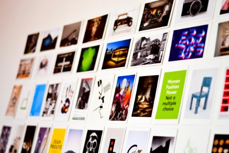 Close-up Photography Of Photographs On The Wall