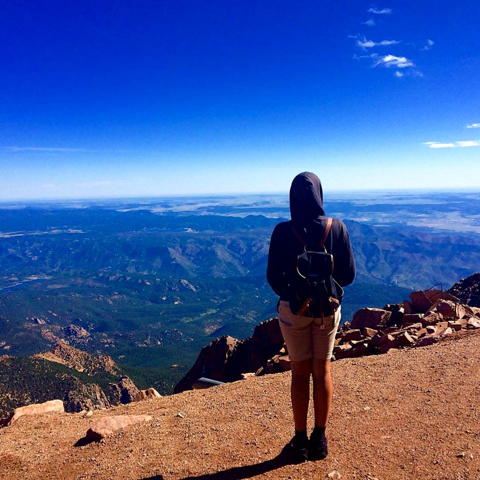 Person Wearing Black Hooded Jacket Staring On Landscape