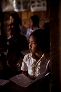 Close Up Photo Of Girl Holding Paper