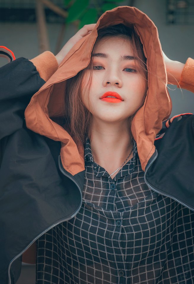 Woman Wearing Brown And Black Hoodie Jacket