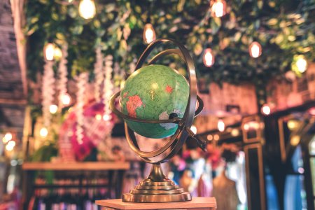 Selective Focus Photo Of Armillary Globe photo