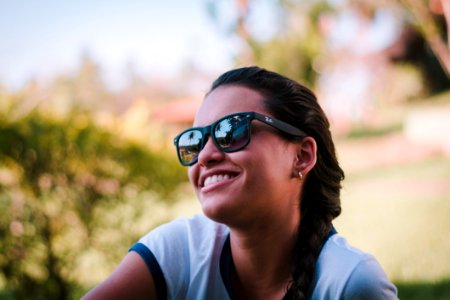 Woman Wearing Black Ray-ban Sunglasses