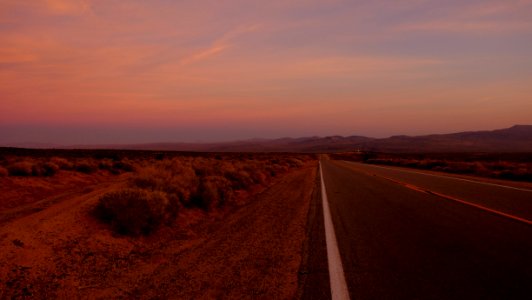 Road Towards Mountain During Sunset photo