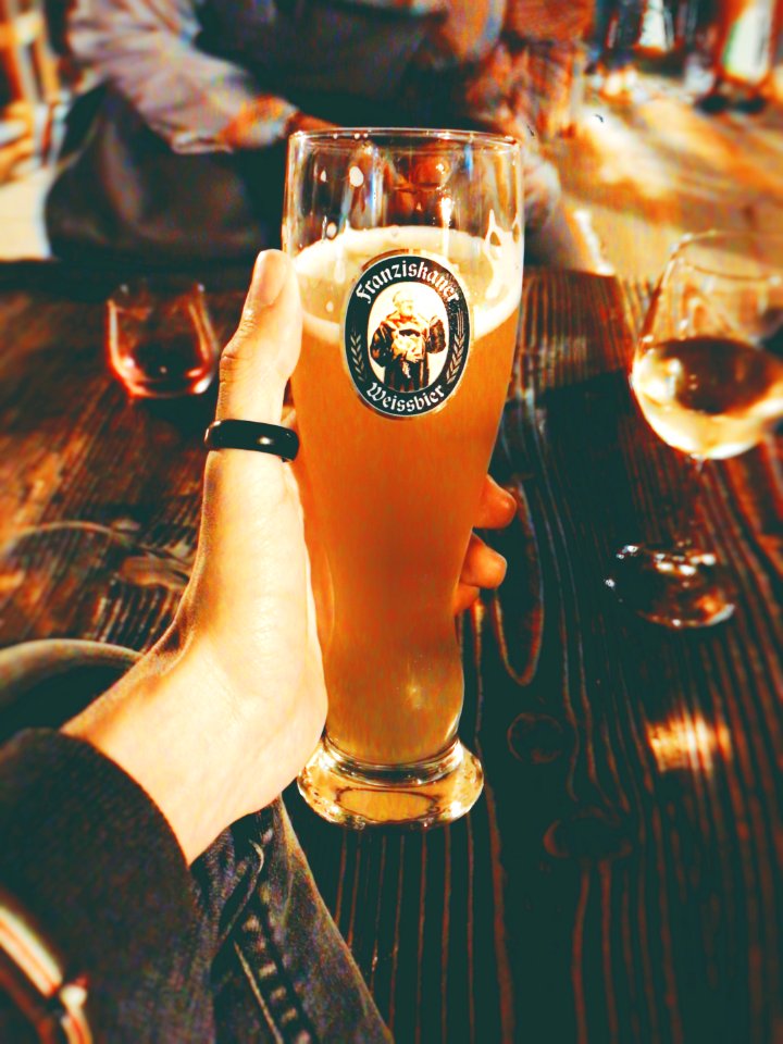 Persons Left Hand Holding Clear High Glass