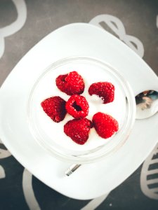 White Cream And Red Berries On Plate