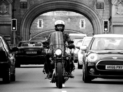 Man Riding Motorcycle Grayscale Photograhy photo