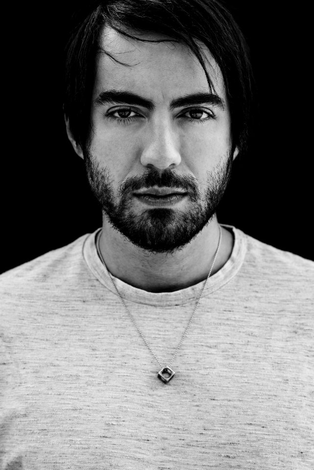 Grayscale Photo Of Man Wearing Gray Crew-neck Shirt