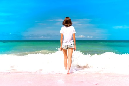 Woman Standing On Seashore photo