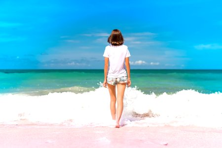 Woman Standing On Seashore