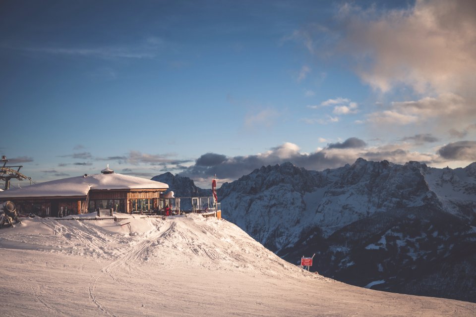 Brown And White Cottage On Mountain
