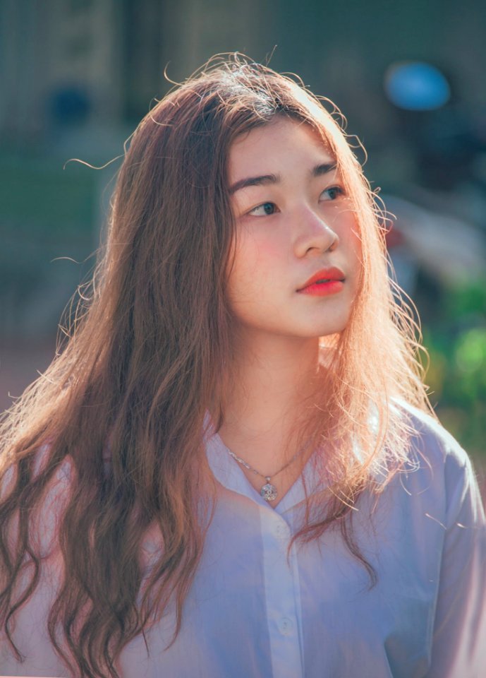 Woman Wearing Purple Button-up Shirt