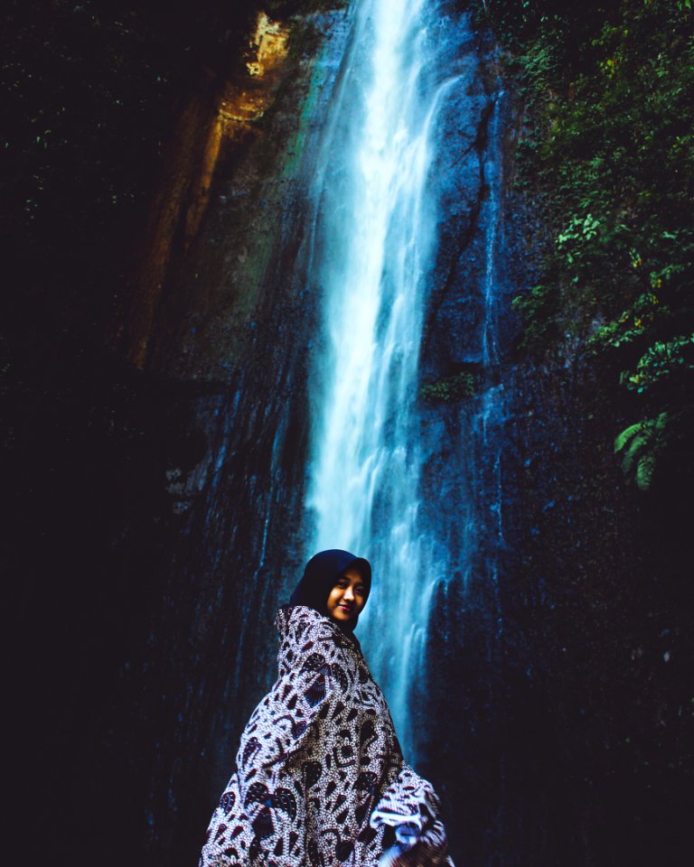 Woman In Front Waterfall