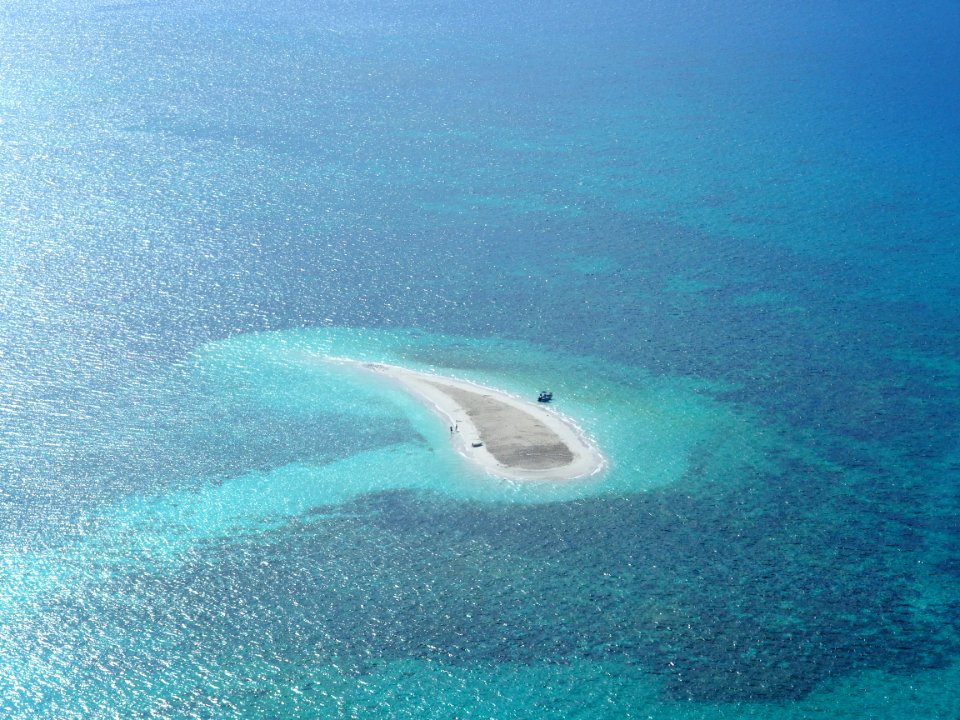 Oval White Sand Island At Daytime