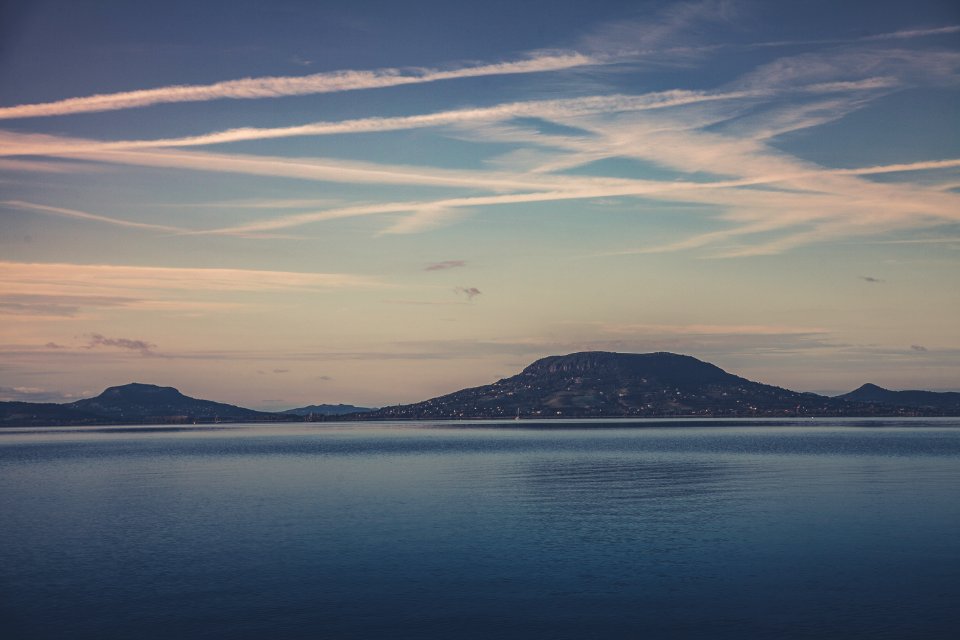 Mountain Beside Large Body Of Water photo