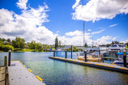 Wooden Dock Under Blue And White Sunny Cloudy Sky photo