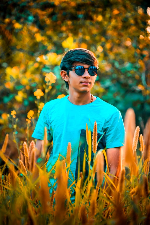 Man Wearing Blue Crew-neck T-shirt