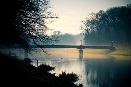 Gray Bridge Above River During Dusk photo