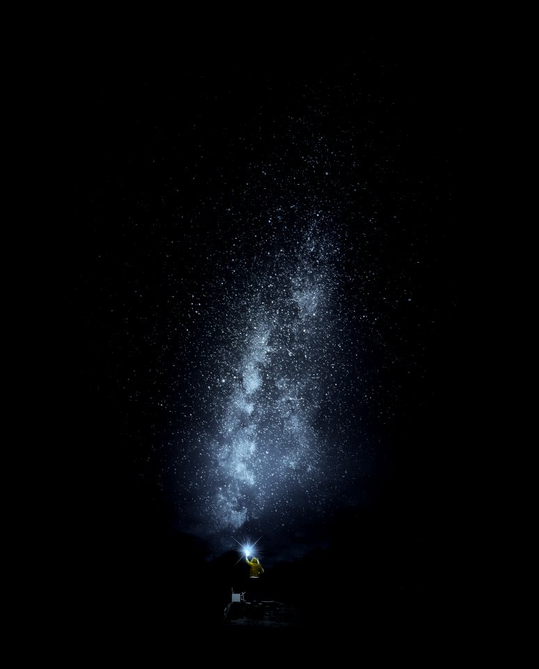Person Standing Under Starry Night