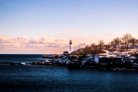 White Lighthouse During Cloudy Day photo