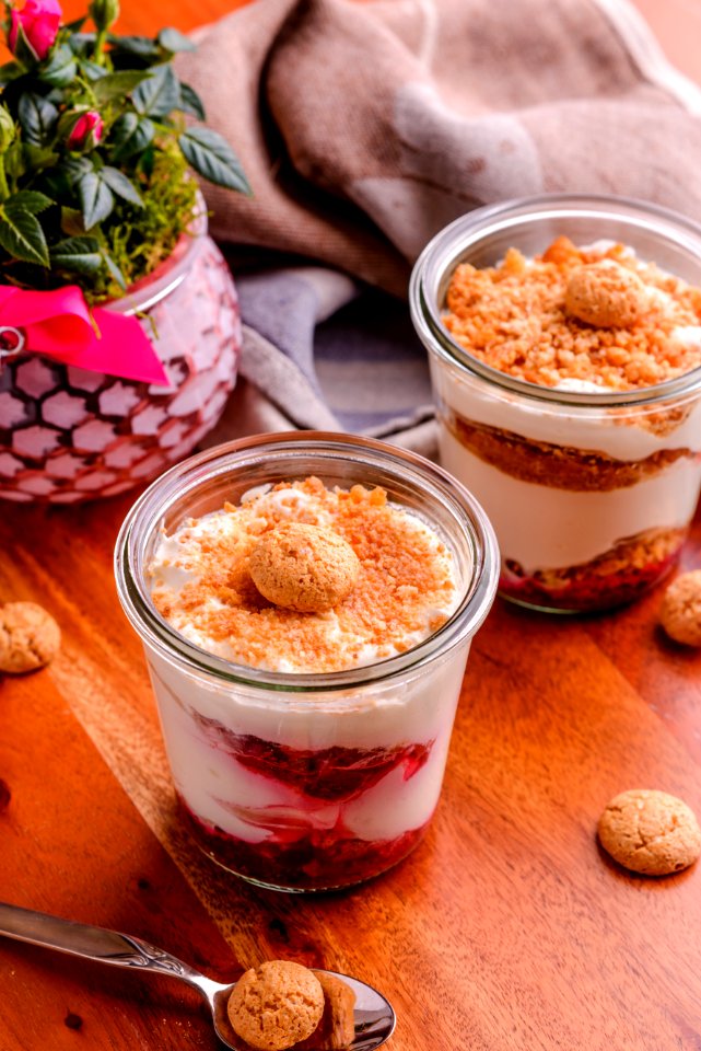 Two Strawberry Soft Served Filled Cups With Cookie Toppings