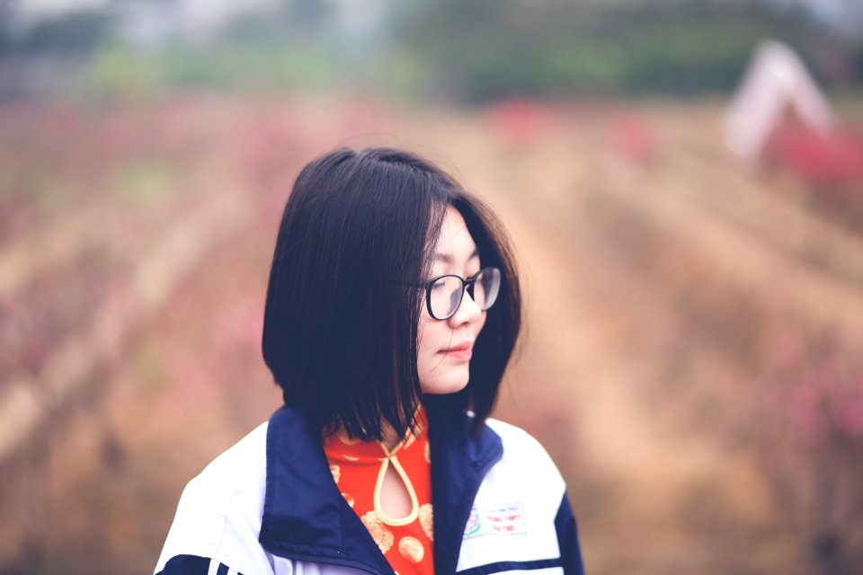 Woman In Black And White Top In Shallow Focus Photography