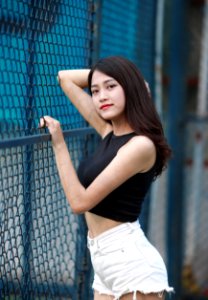 Woman Wearing Back Crop Top And White Short Shorts photo