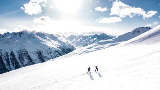 Two Man Hiking On Snow Mountain photo