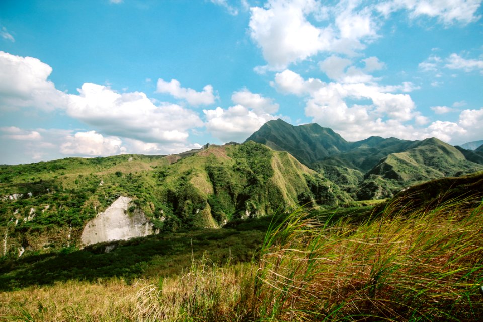 Photo Of Mountains Covered With Grass