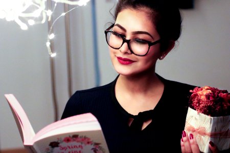 Woman Holding Book