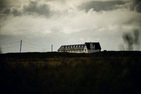 White Concrete House Under White Clouds photo