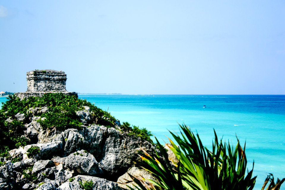 Photography Of Ocean And Rock Formation photo