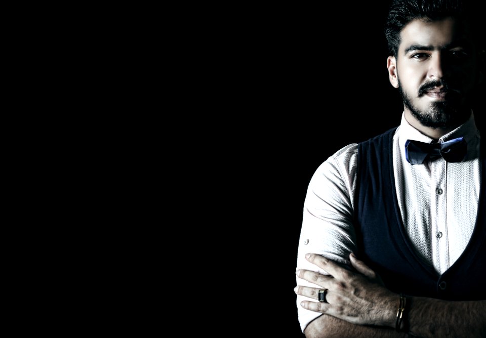 Man Wearing White Shirt And Black Waistcoat