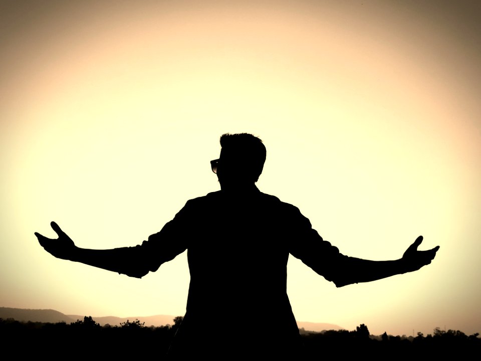 Silhouette Of A Man Wearing Eyeglasses