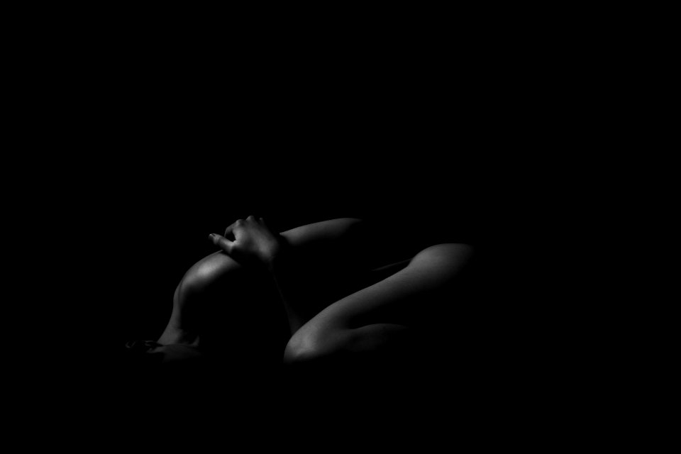 Grayscale Photo Of A Woman Sleeping