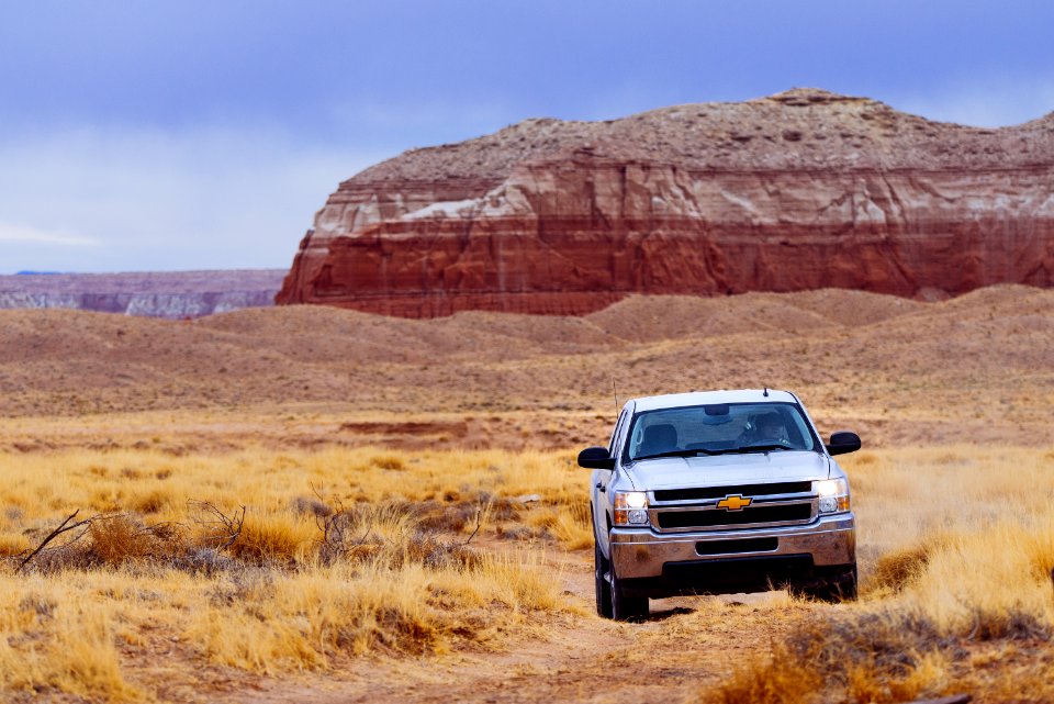 White Chevrolet Vehicle On Dessert photo