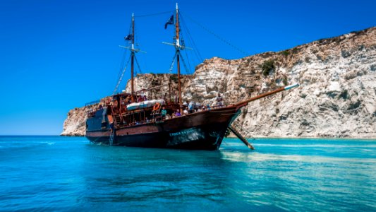 Brown Ship On Body Of Water