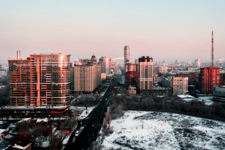 White And Red High-rise Building During Winter Season