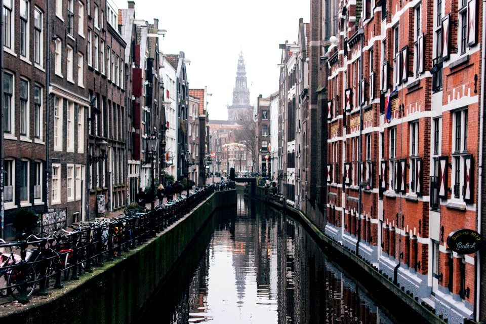 Photography Of Buildings Near The Canal