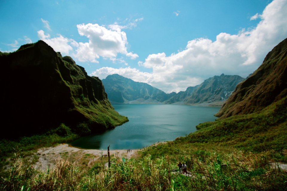 Photography Of Mountains Near Body Of Water photo