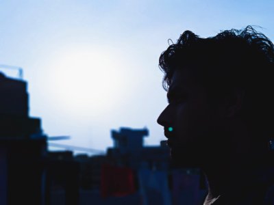 Man Face With A Background Of Buildings