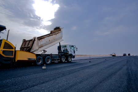 White And Brown Dump Truck