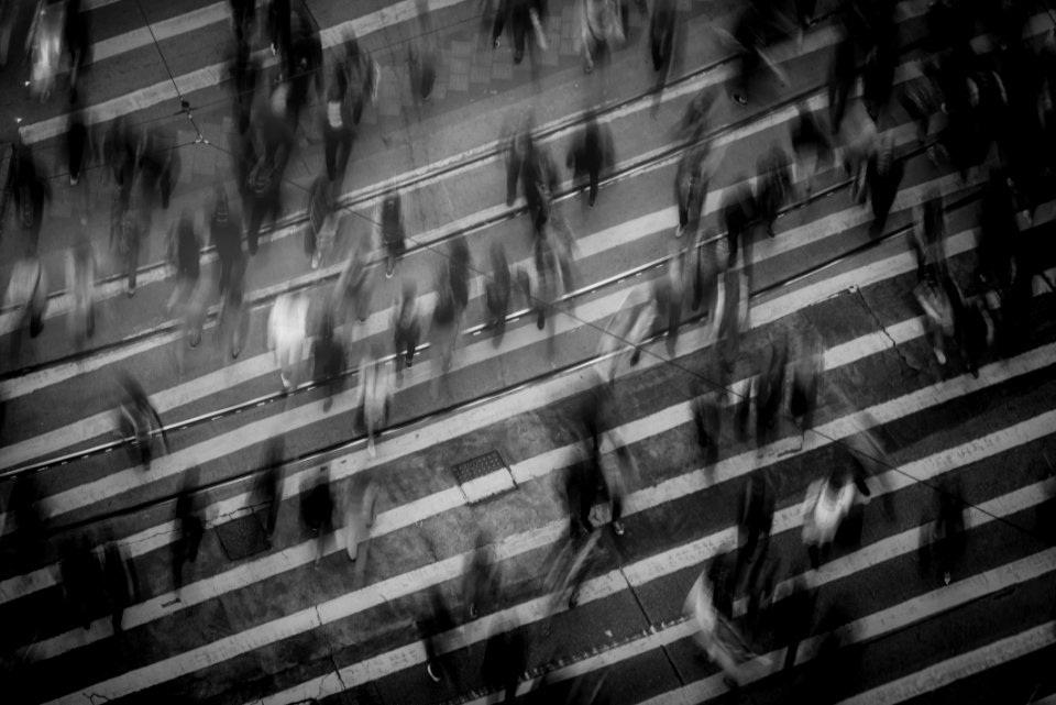 Time Lapse Photography Of People Walking On Pedestrian Lane photo