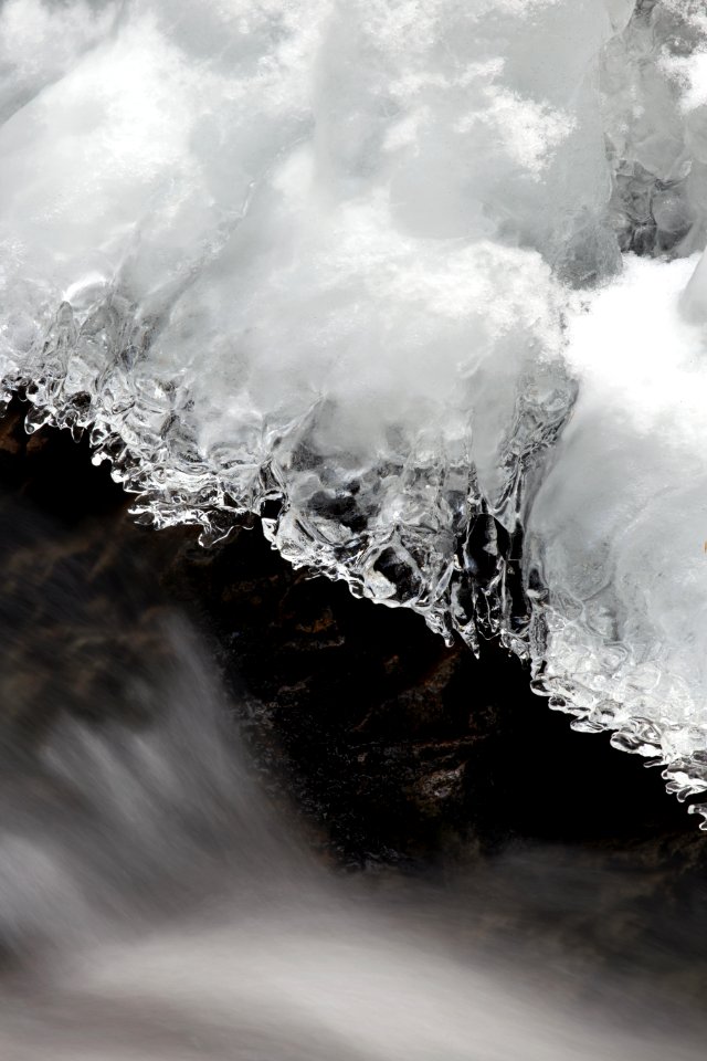 Icicle Above Flowing Water