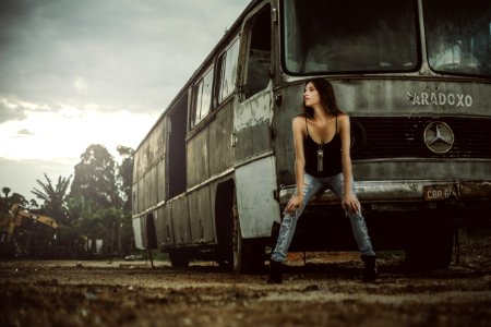 Woman Sitting In Front Of Bus photo