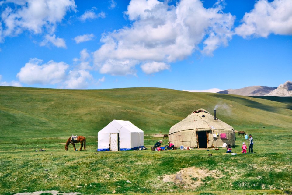 Photo Of Hut And Tent On Grass Field