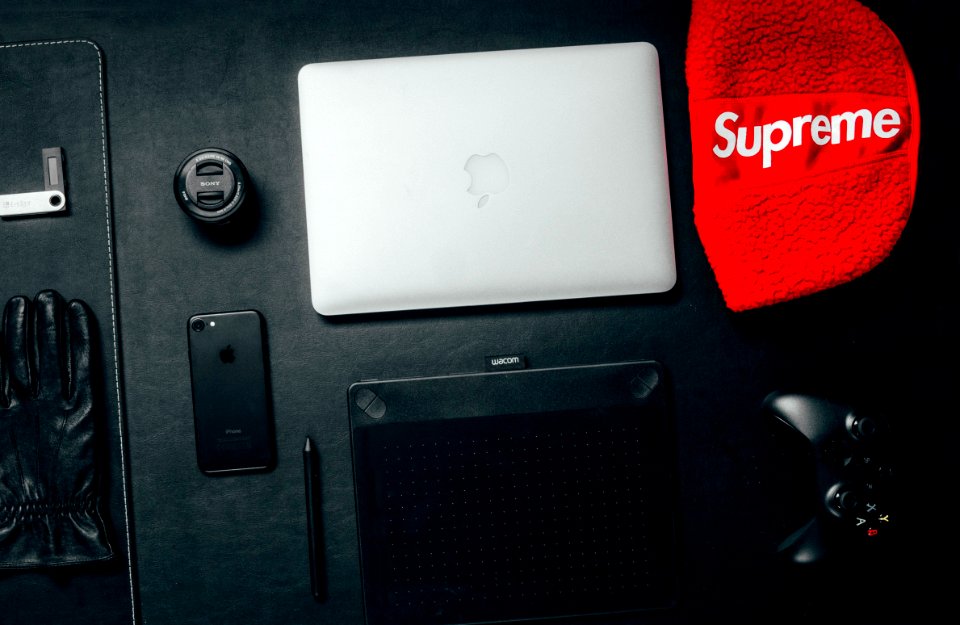Macbook Beside Red Supreme Textile