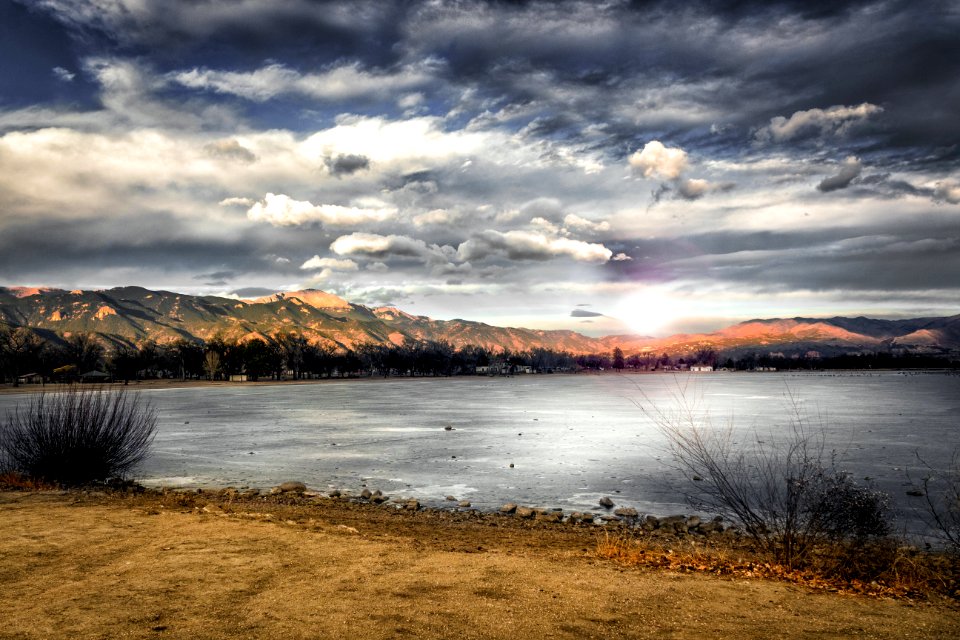 Landscape Photography Of Mountains Near Body Of Water