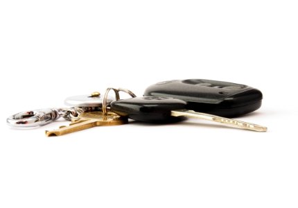 Two Black And Brass-colored Keys With Fob photo