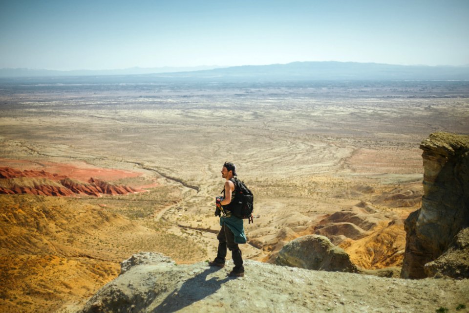 Man Standing On Peak