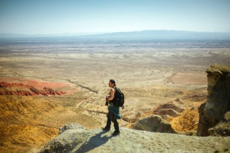 Man Standing On Peak